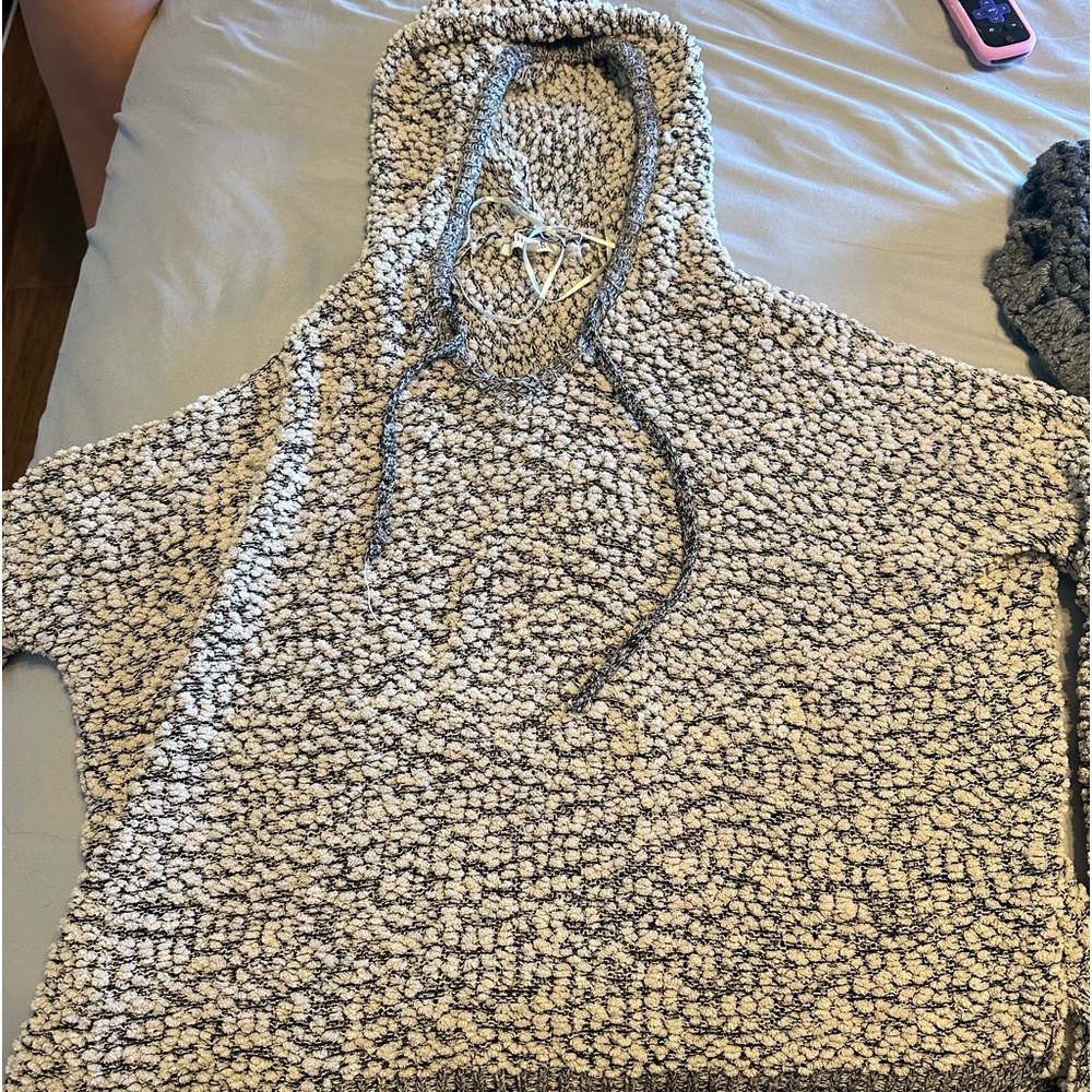 A hooded sweater.